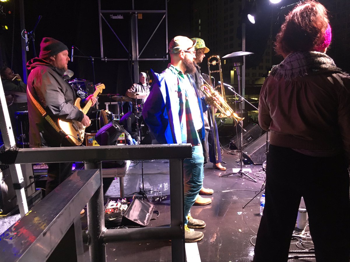 rtmarriott's tweet photo. #firstnighttacoma a little damn but rock in’.  Here til midnight.  Downtown tacoma.  Tons of performances. Fireworks at midnight.  I’m at the mainstage all night. Family friendly NYE!  #k5weather https://t.co/AC6Ezh5UMC