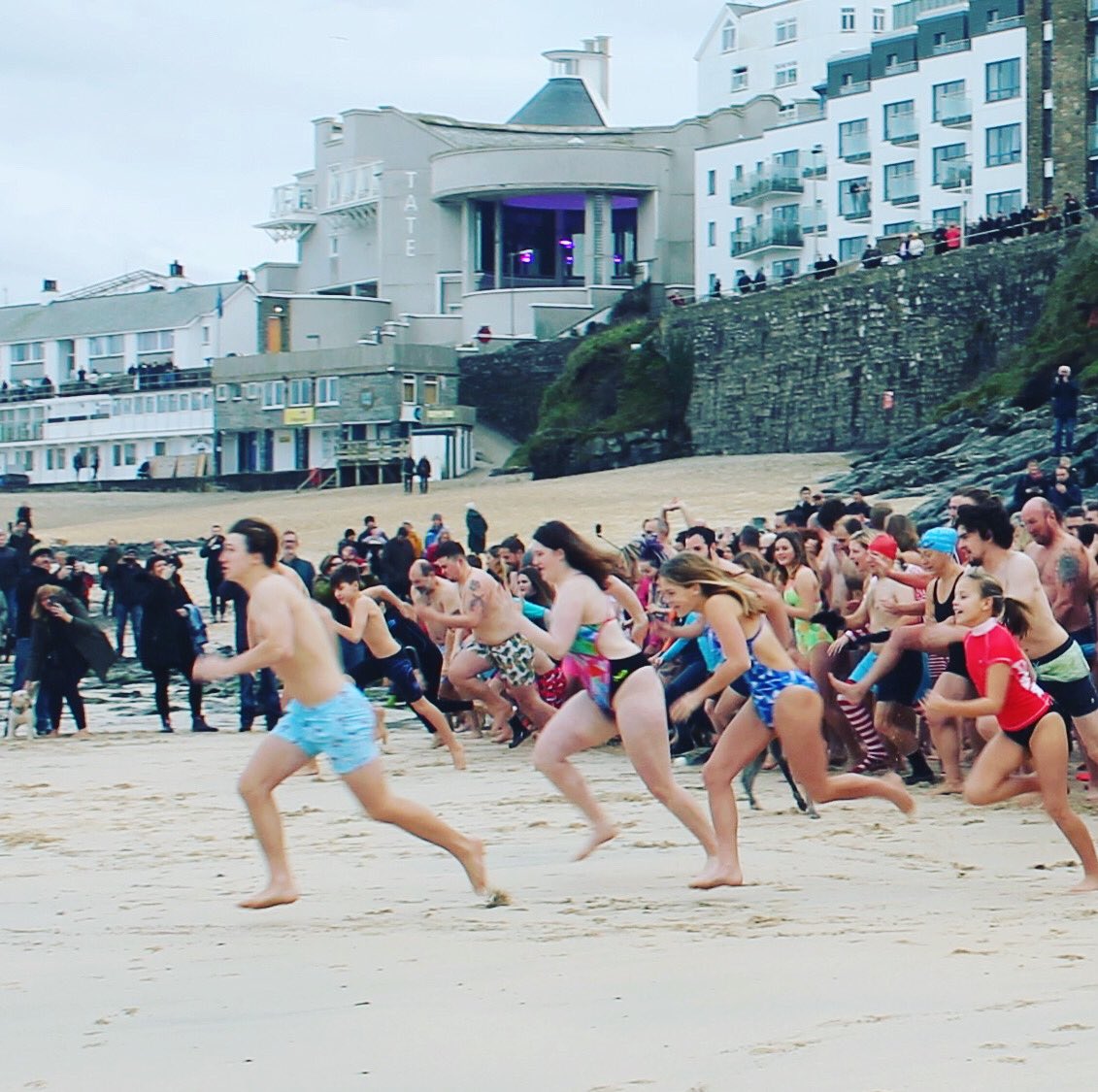 Fantastic turn out for the St Ives Surf Life Saving Clubs New Years Day Dip 2020. Cosies, wetsuit and great Fancy dress costumes this year. #sislsc #newyearsday2020 #seadip #stivescornwall  #porthmeor
