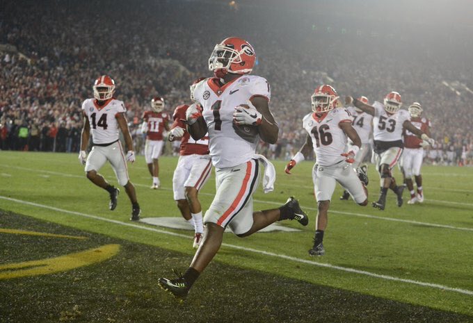 MattDeBary's tweet photo. Two years ago today, the Georgia Bulldogs defeated Heisman trophy winner Baker Mayfield and the Oklahoma Sooners in one of the greatest Rose Bowls of all time.

Georgia was down 31-14 at one point. They would storm back to win 54-48 in double overtime. https://t.co/COuUstVNf3
