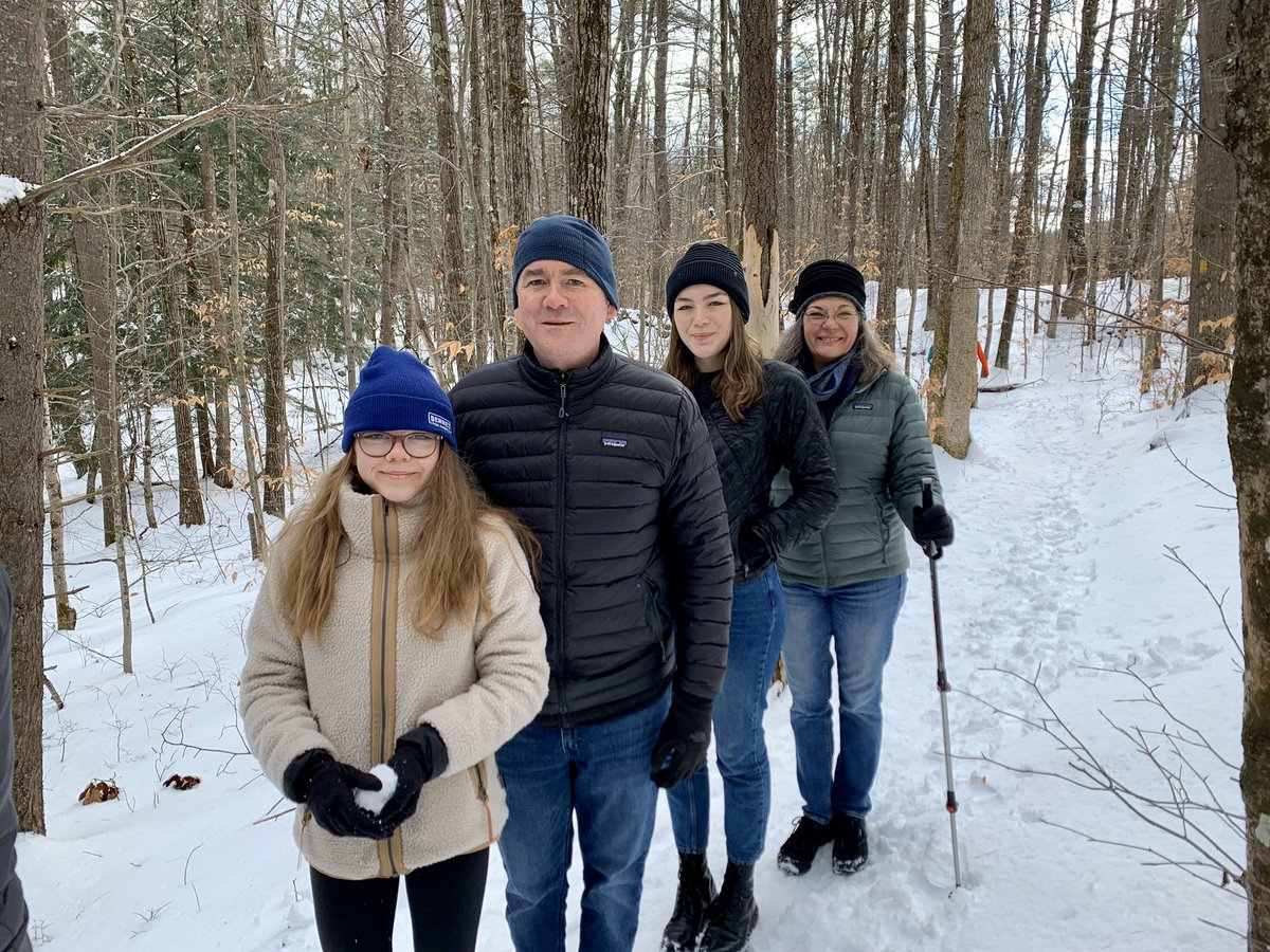 MichaelBennet's tweet photo. Grateful to kick off the new year with my wife @DaggettSusan, two of our daughters, NH Rep. @dave211, and the community in Hopkinton for their annual hike! The beautiful outdoors in the Granite State reminds us of home. https://t.co/GFxgHo2No0