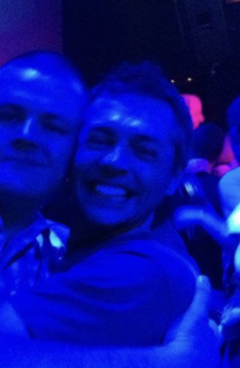 Alexis_C_Ross's tweet photo. This guy has been in my thoughts all day. Such horribly sad news this morning. RIP Gary, a suitably blurry picture from the whiskey / Fanta night at the end of season MotoGP party in Valencia I’m not sure I ever recovered from x https://t.co/5ve54i87Zd