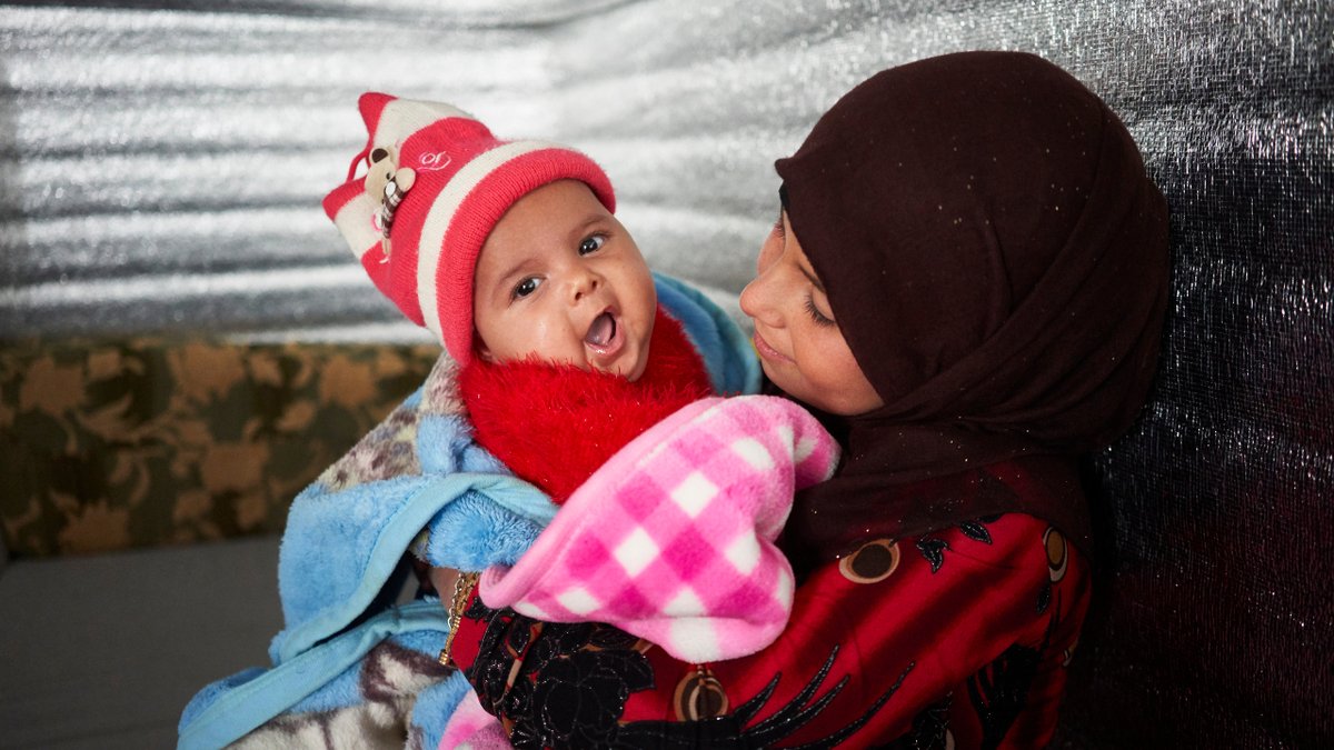 UNHCRCanada's tweet photo. Your generous support of #refugees has helped ensure that Alaa and her baby sister Muna have the supplies they need to #makewinterwarm in 2019.

From all of us here at UNHCR Canada, wishing you and your loved ones all the very best for the New Year 🎊 https://t.co/zmxlYPsIpm