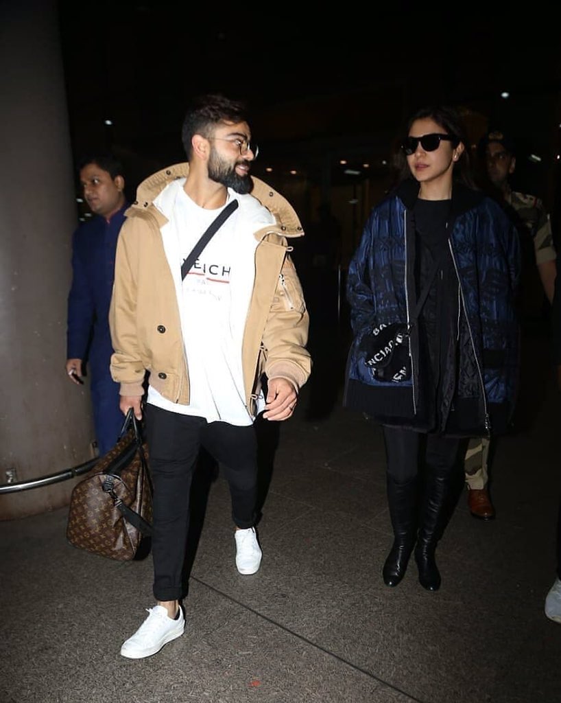 In the same look as above picture and here, the way they walk out in style, looking that badass couple which they’re. The way Virushka can do both is just, wow! Virat looks so hotter every passing day is beyond me. Anushka Sharma, this woman has made airport looks it’s b!tch.