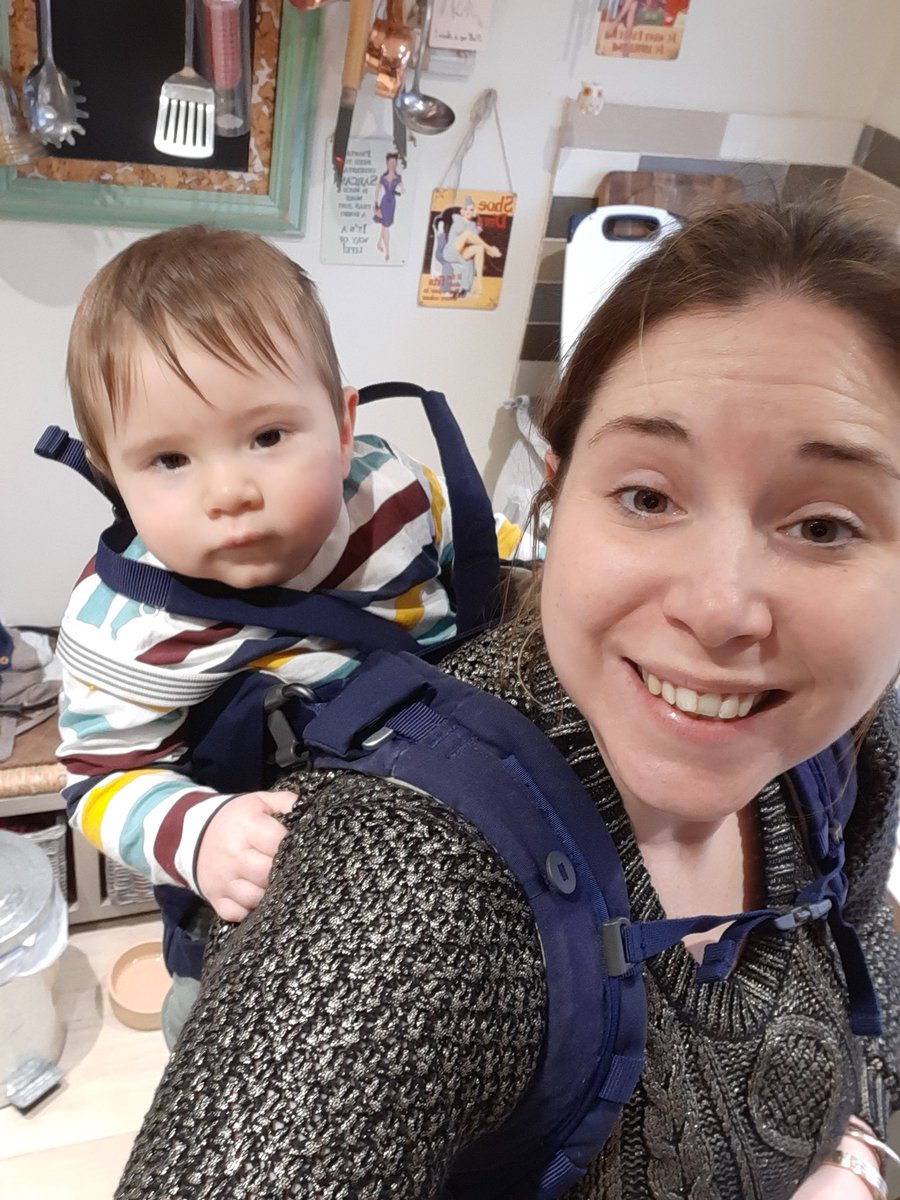 LauraFarrar88's tweet photo. Not resting like I should be and looking very goofy here is the new way we make a cake with a baby! #babywearing @StokkeBaby #useitforeverything #baking https://t.co/PkGcY7UQuu