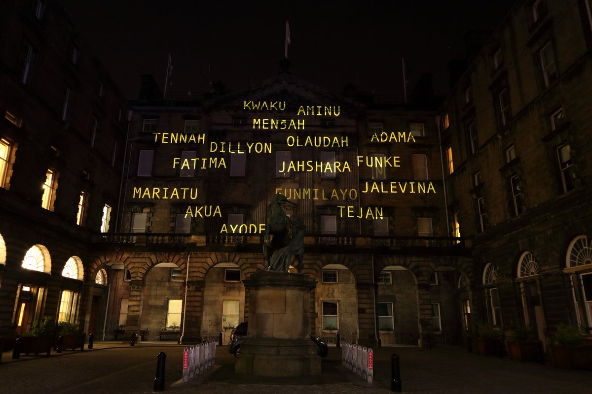 MrGGaw's tweet photo. Projected on to the City Chambers, "Sugar for Your Tea" reflects on the darker side of Scotland's maritime history. Written by Kayus Bankole, film by @riannelwhite (https://t.co/JnV3g3eFR8), music by @Youngfathers. Brilliant. #MessageFromTheSkies #Shorelines #EdHogmanay https://t.co/EPehfbqP0g