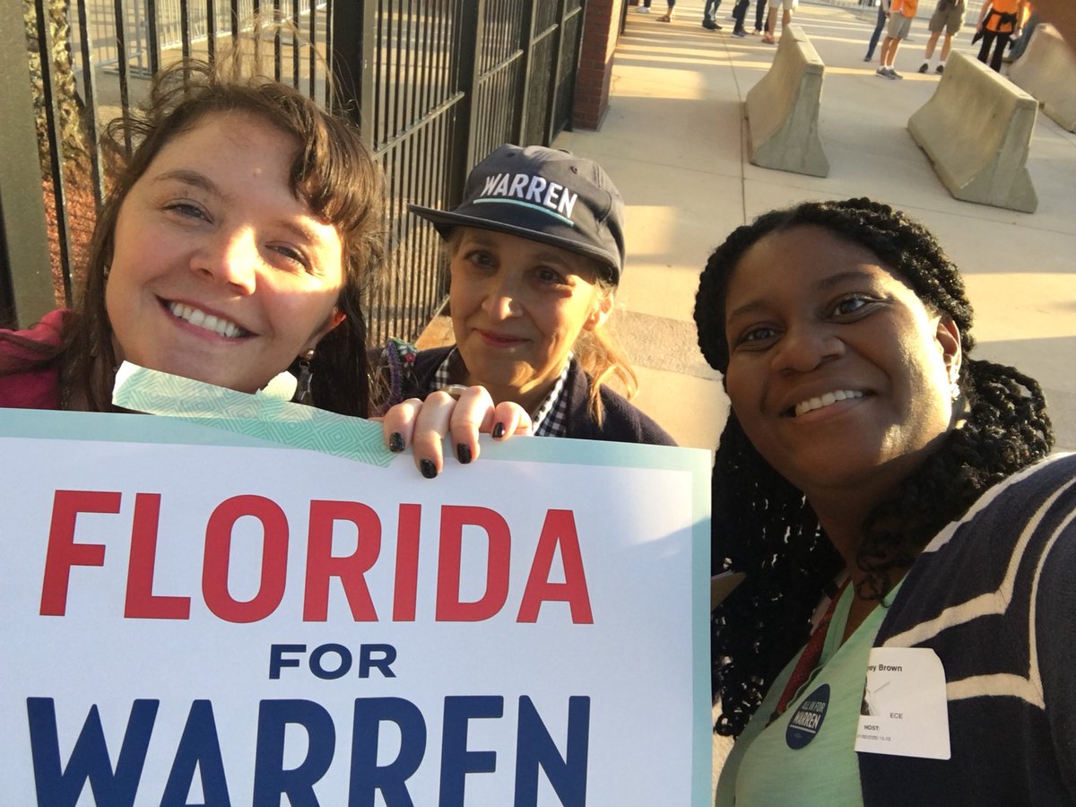 JaxForWarren's tweet photo. Just some of the #TeamWarren Jax fam talking to voters at the Tax Slayer Gator Bowl tailgates! Who are you rooting for tonight? https://t.co/uhte1mKs17