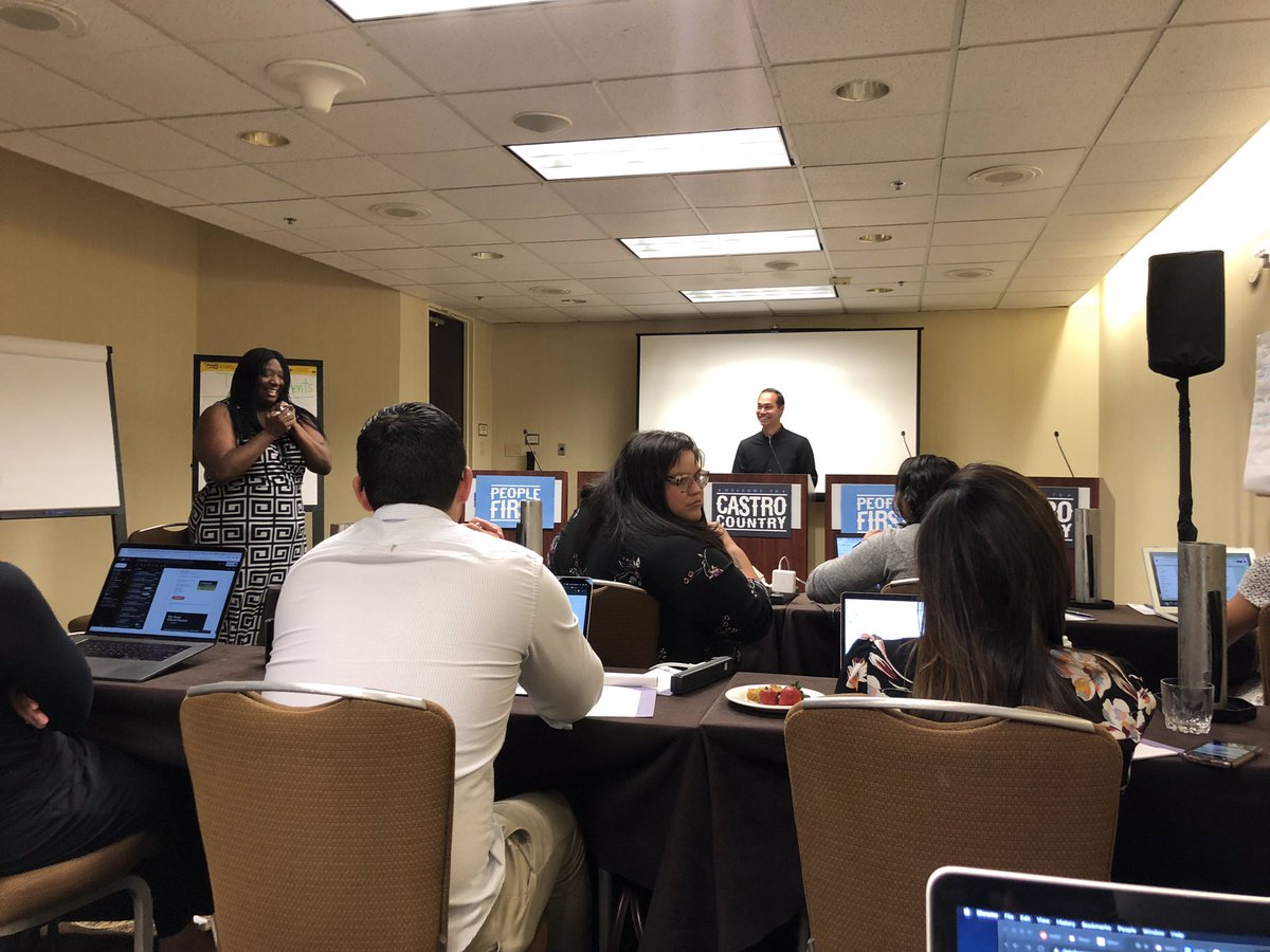 MayaRupert's tweet photo. This is one of my favorite moments from this campaign but one that I never shared before. The picture is from debate prep, and @JulianCastro is teasing me about something, and I’m contemplating throwing the balled up piece of paper in my hands at him. Basically, a Wednesday. https://t.co/2DChOHLLpi