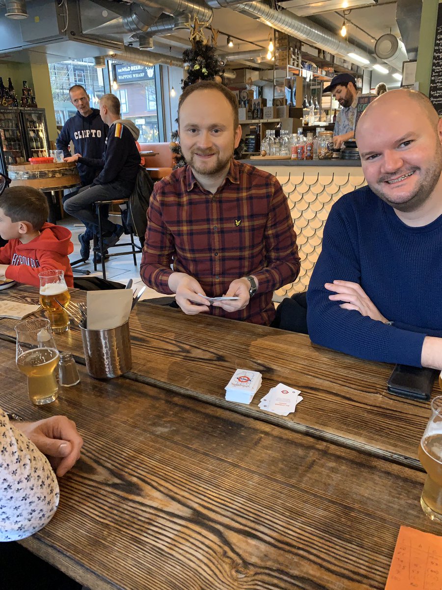 Sean dealing cards to Andy, playing Mind the Gap