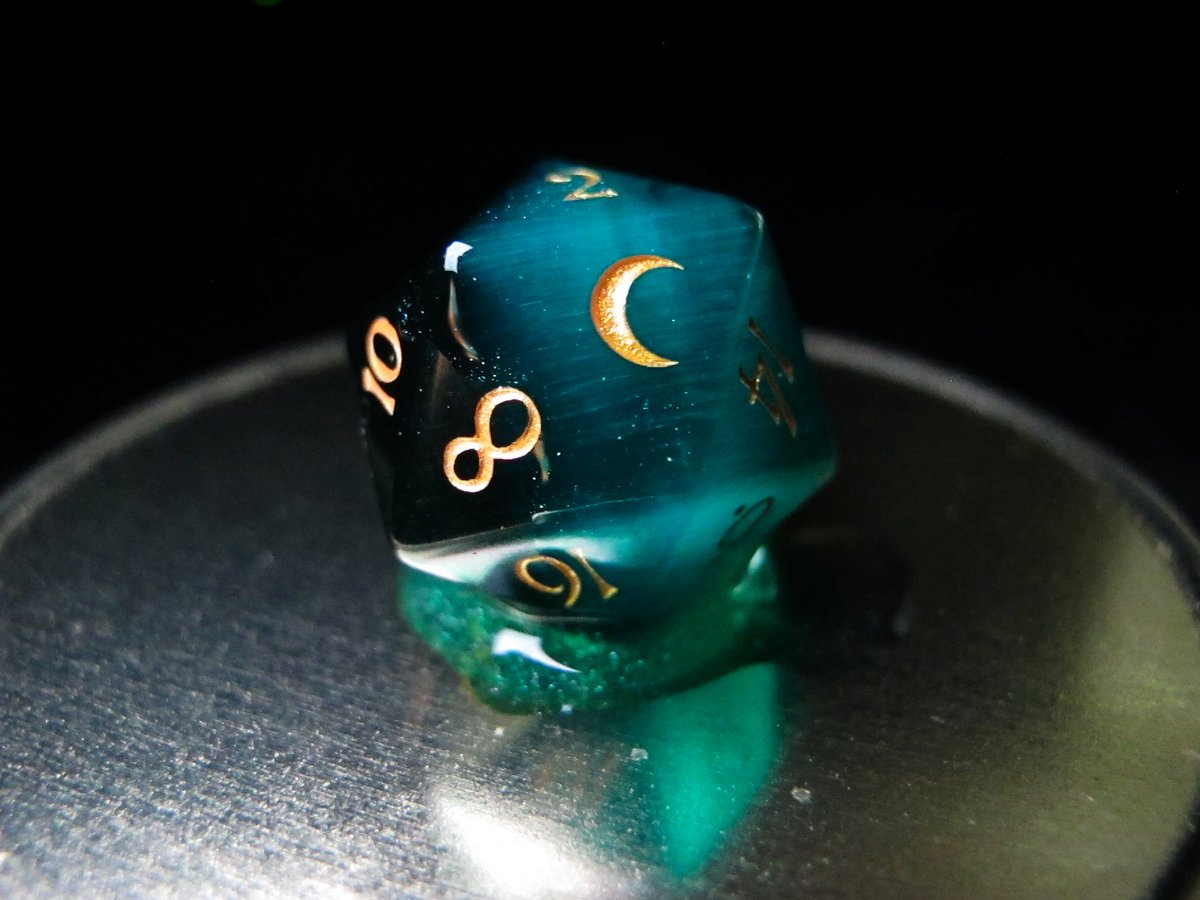 Who wouldn't want to start the New Year in the emerald waters of the Feywild. What would it be like to bath the night away with twinkling faries under the gaze of a serene moon?

Dice: @urwizards 

Necklace: @GinaBlackArt

#dice #diceporn #butterfly #butterflynecklace