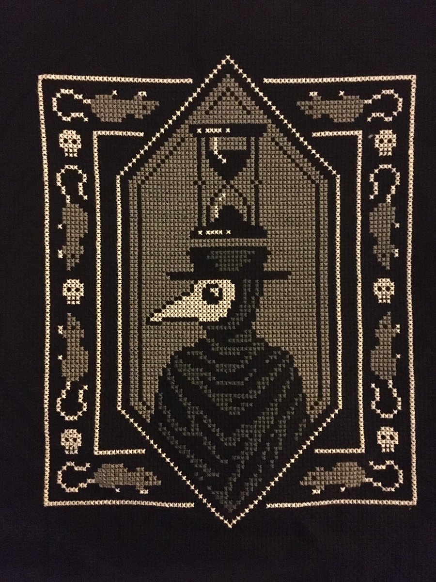 I made this for a friend for Christmas and I'm deeply proud of it. A plague doctor cross stitch with a border of rats and skulls!