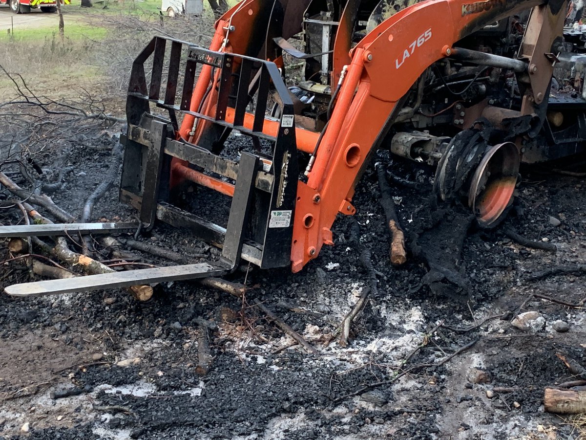 CALFIRE_ButteCo's tweet photo. This afternoon firefighters responded to a burning tractor in the Butte Creek Canyon. Fully involved when crews arrived. Use caution when operating heavy equipment around a burn pile. #RichFire https://t.co/8gc6Gp9ntc