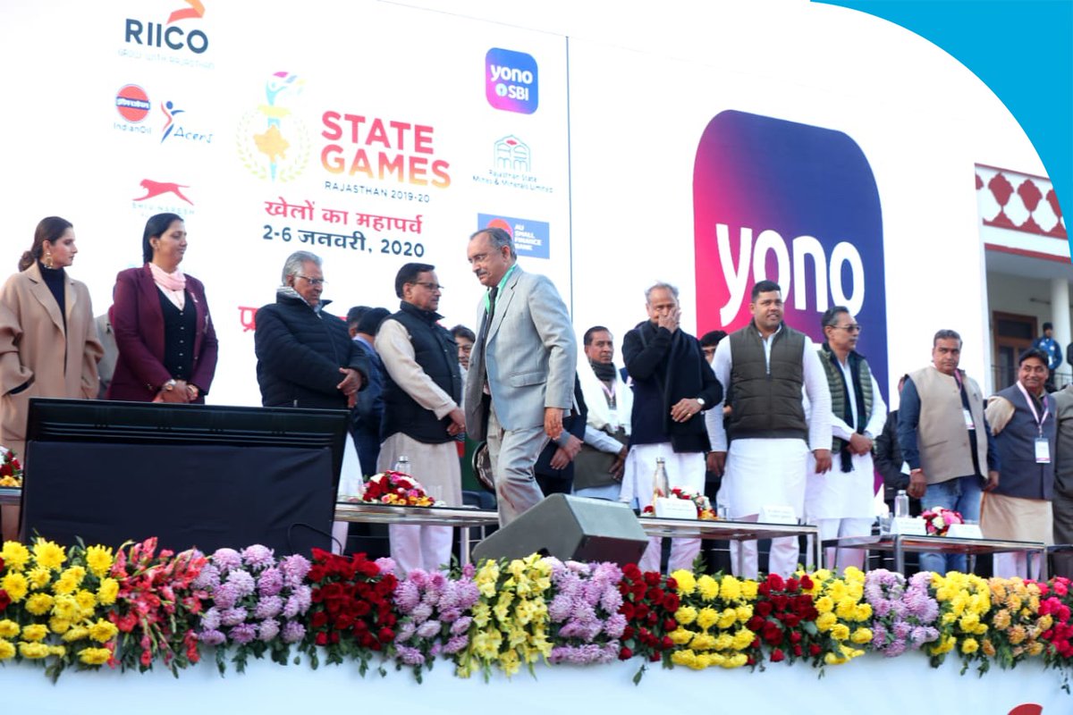TheOfficialSBI's tweet photo. SBI was proud to be a part of the first ever Rajasthan State Games. As co-sponsors of the event, SBI presented every player with YONO branded tracksuits. @Ravindra361962 (SBI CGM) also received a momento from @AshokGehlot51 and @AshokChandnaINC at the event. #SBI #YONOSBI https://t.co/ahX2QOH4el