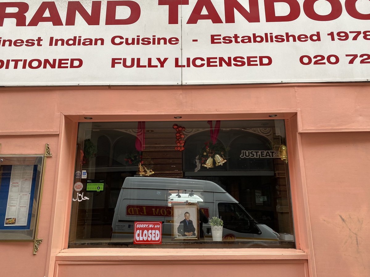 bradmewhat's tweet photo. @GaryLineker who’s this mystery man in the window of this fine Indian restaurant? 🤔 https://t.co/gQYGIzt08n