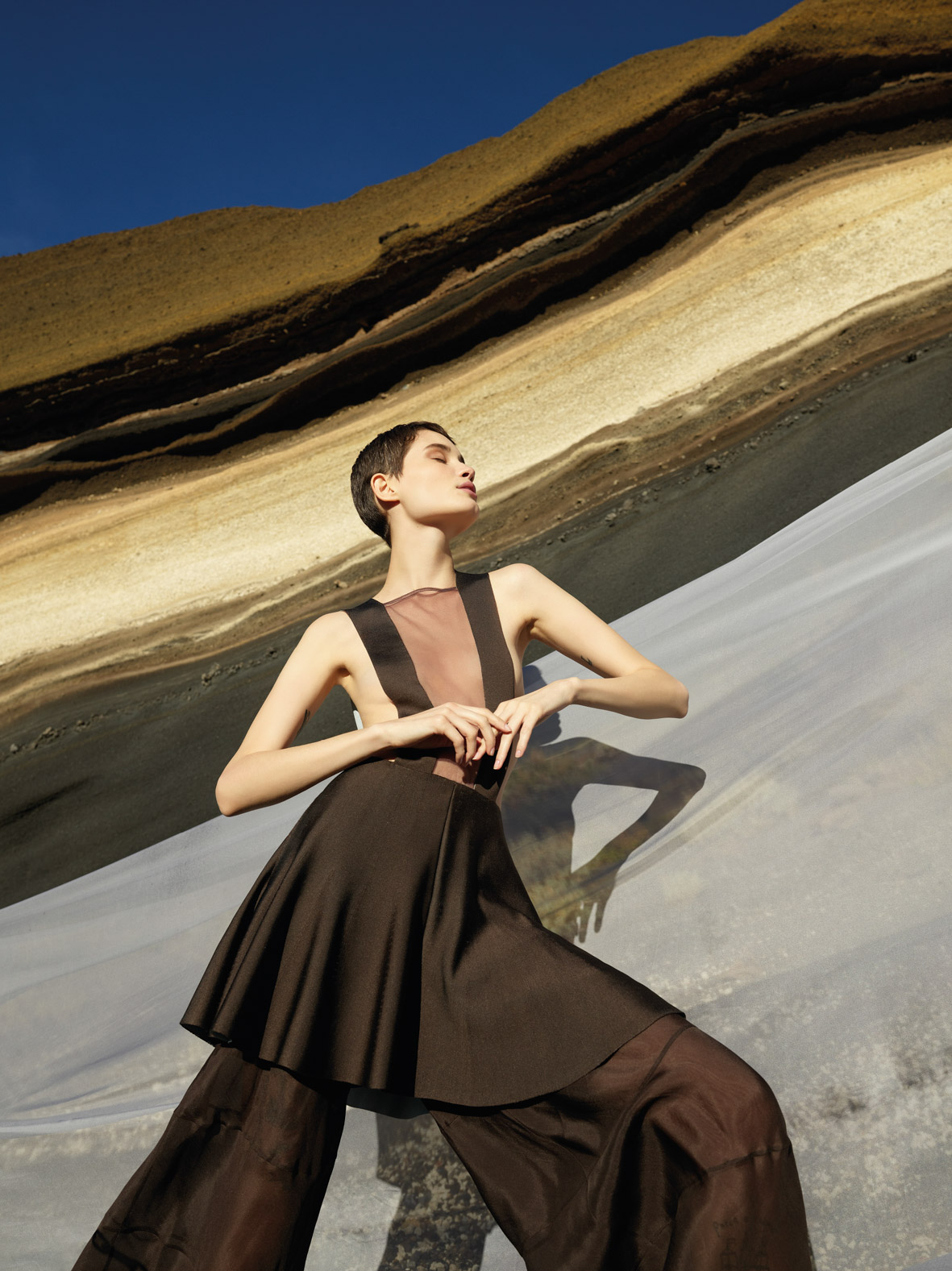 Armani on X Introducing the Giorgio Armani Spring Summer 2020 campaign where the landscape of burnt colours rocky surfaces and clear skies enhance the elegance of the GiorgioArmani SS20 collection Cre...