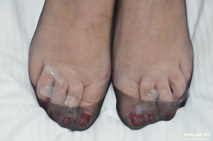 You can't stop staring at my stocking feet can you? go on then whilst i wank with my big dildo you can