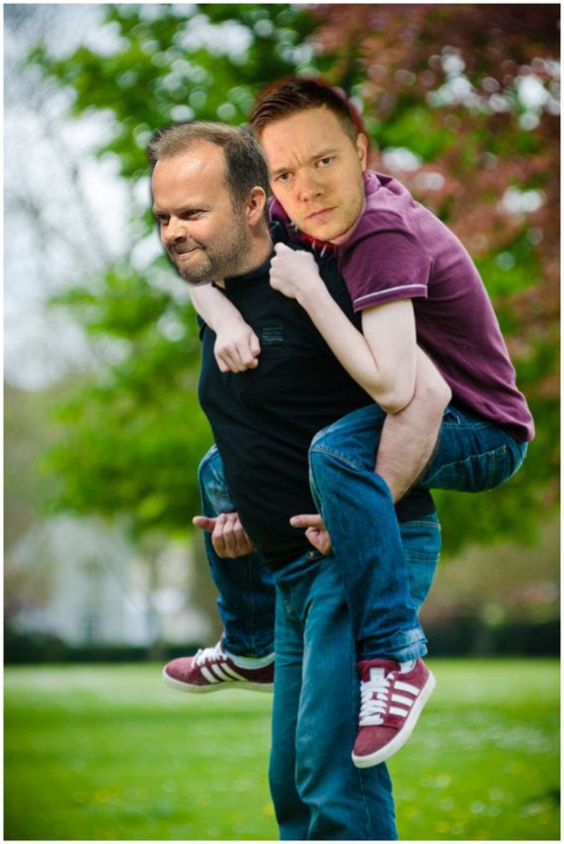 EdThroughTime's tweet photo. Its Dad and Lad day at Carrington. Cheer up @markgoldbridge im taking you you to see the players....my facial expression suggests somebody didnt turn down seconds of the Christmas pudding...#MUFC #MUFC_FAMILY #theunitedstand #fulltimedevils https://t.co/2ouLeNp6XC