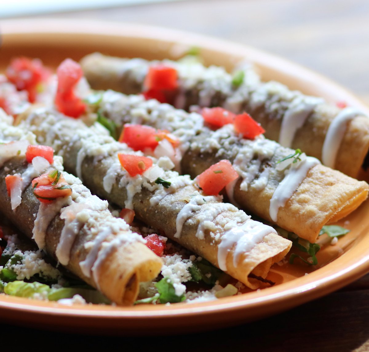 Gloomy weather gets better with great food. Come on in and grab a plate of Hibiscus Taquitos! 😋💀