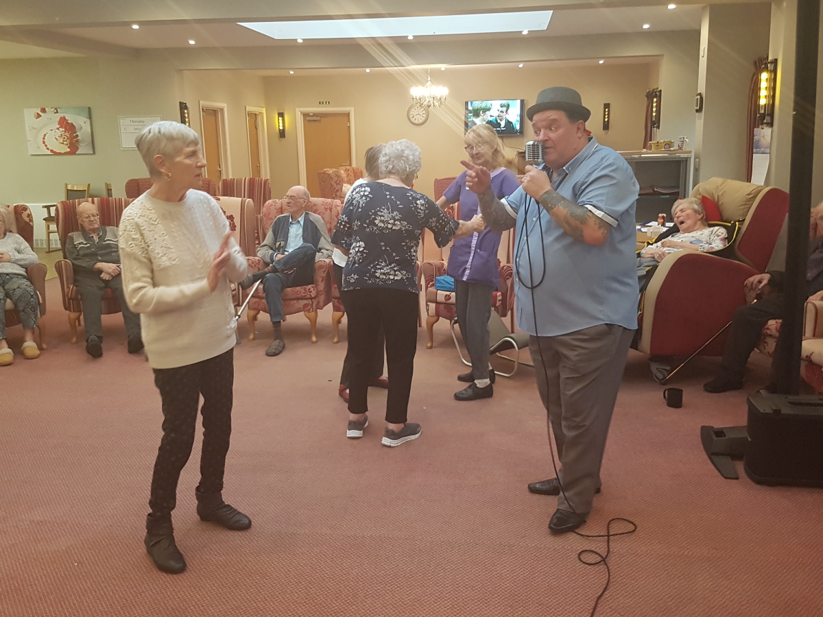 Carehomesuk's tweet photo. "The Soulster" Sid St. John joined the residents and staff at The Place Up Hanley to celebrate a special birthday occasion 🎶🥳🎁🎂

#HappyBirthday #MeaningfulActivities #LiveMusic https://t.co/cjxh7vR8l6