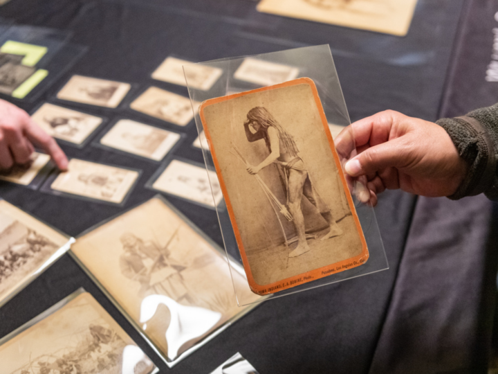 Photo by Elias A. Bonine of an unidentified Yuma man wearing traditional breechcloth, hairstyle, holding bow and arrows.