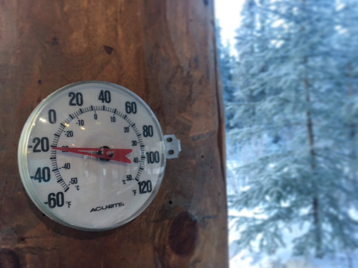 An outside thermometer reads -20 degrees Fahrenheit or -28.9 degrees Celsius.