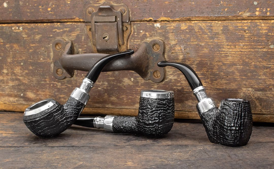It's our birthday and we're celebrating with an exclusive, limited edition line of SPC 20th Anniversary Peterson pipes, featuring jet-black sandblasts and sterling silver spigot mounts. smokingpip.es/2ZMMfJq