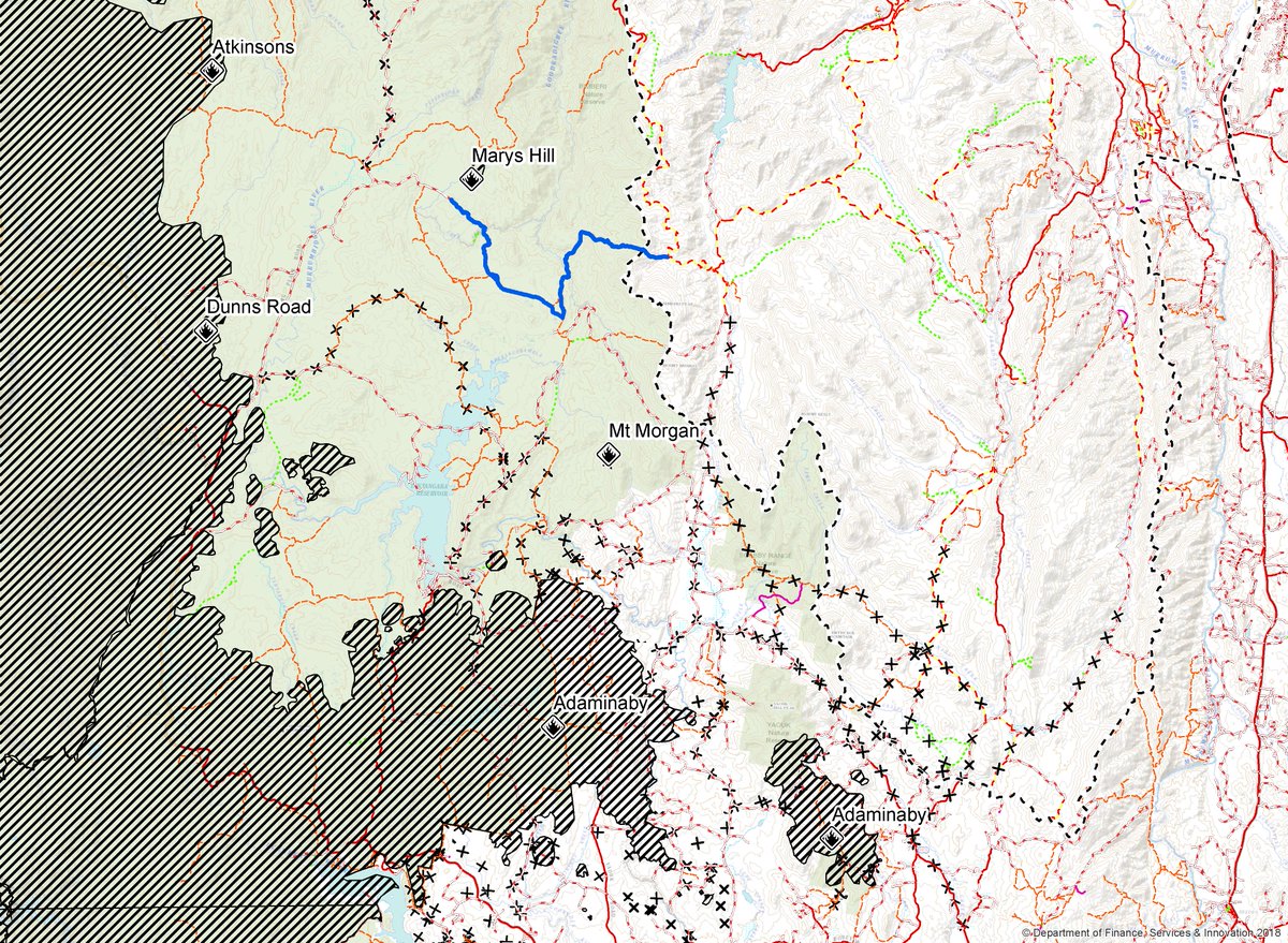 ACT_ESA's tweet image. Today machinery strengthened boundaries around vital assets. Photos: plant machinery enhancing containment lines. Map: blues line is an access trail to fire, black crosses are implemented containment lines, black dotted line is the ACT border.