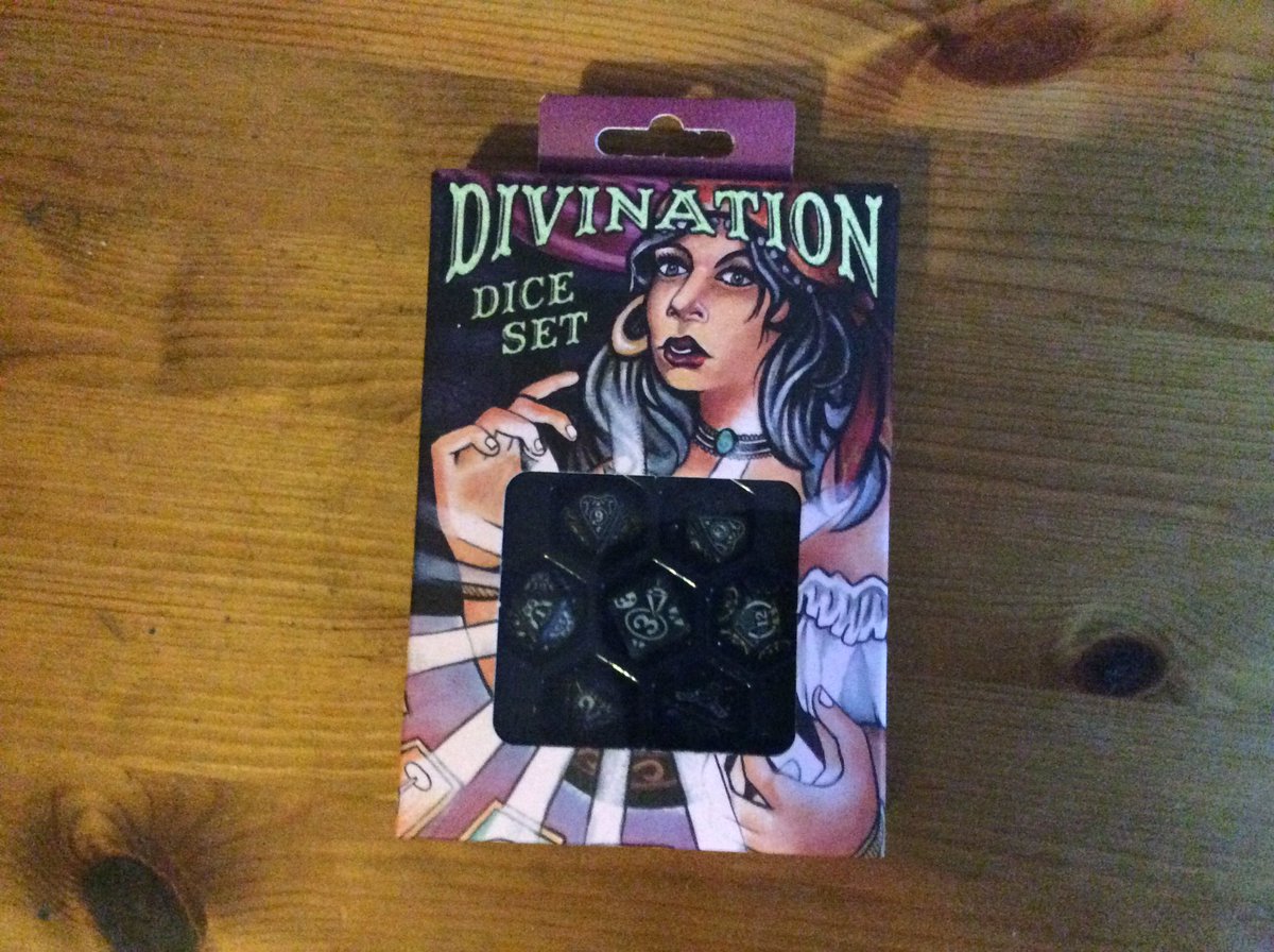 Bosco_ca's tweet photo. New year, new dice mail! Received these lovely glowing dice last week! Loving the art on the packaging also! Now where did I put that tea towel and dangly earring!  😂😂
#dice #diceaddict #polyhedraldice #DnD #ttrpg #rpg #dicegoblin #dicelove #nicedice #D20 https://t.co/SnibU1fUNt