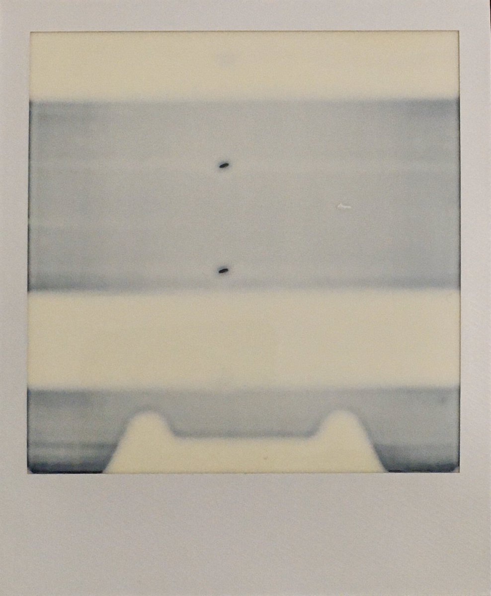 LocalAssociate's tweet image. Polaroid Accident, ND filter jammed and left it’s silhouette behind for posterity. #polaroid #accidentalphotography #lightwriting