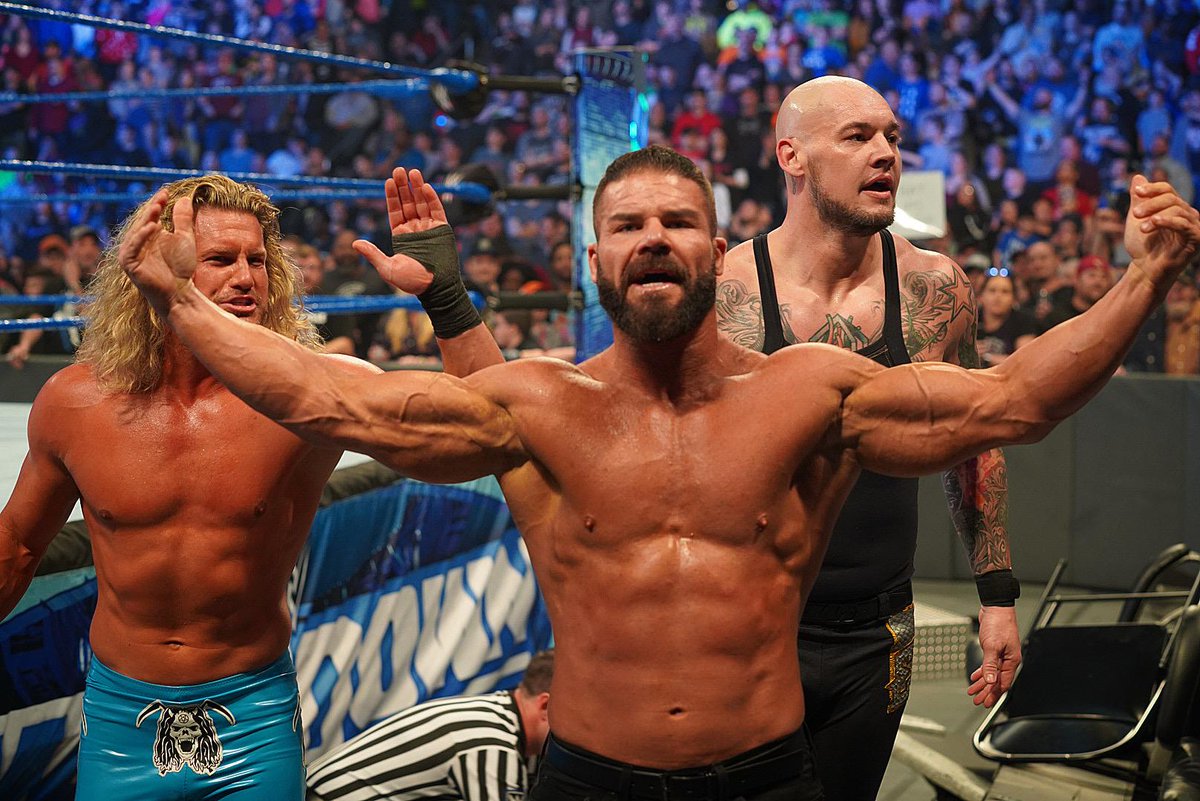 WWE's tweet photo. The #GloriousOne is BACK. You've been warned, blue brand. #SmackDown @RealRobertRoode @BaronCorbinWWE @HEELZiggler https://t.co/PXqXJX8ruT