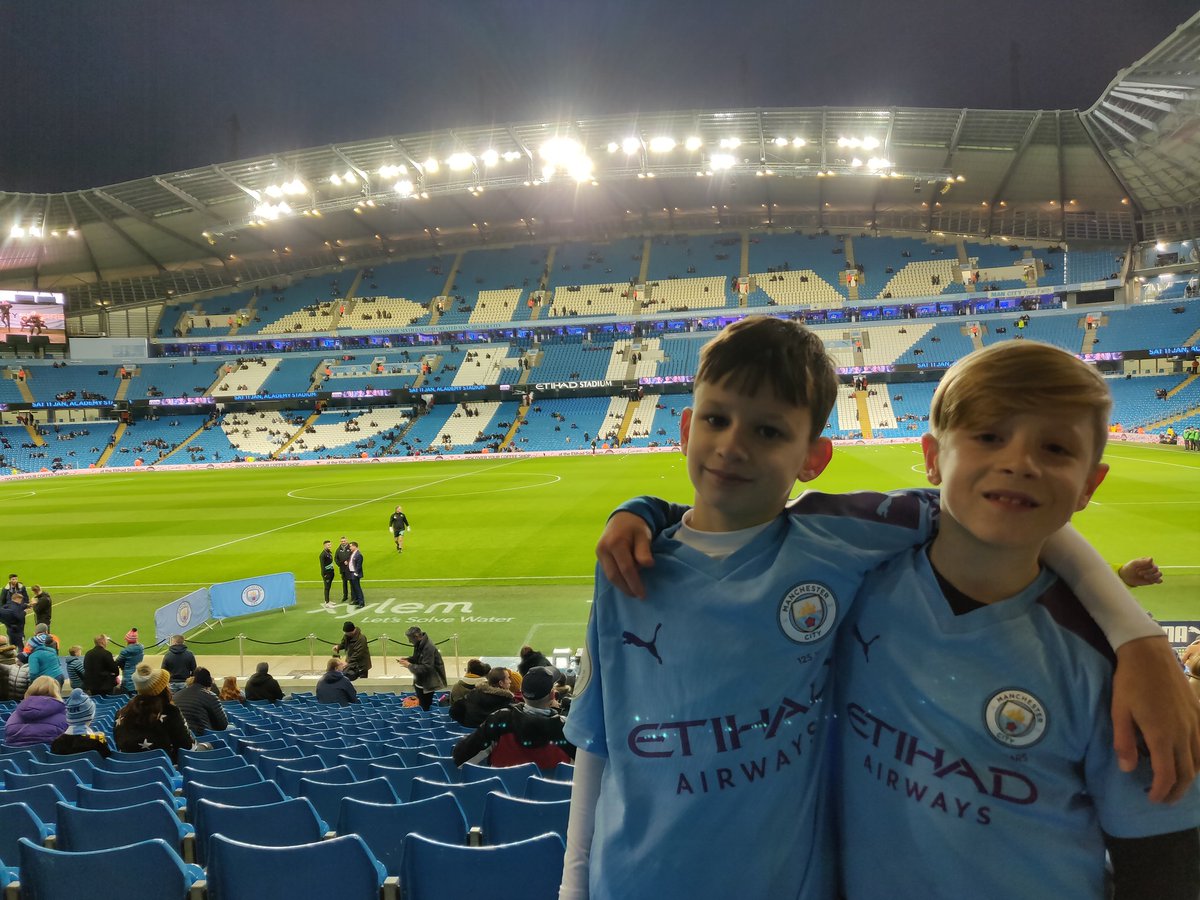 DWidden's tweet image. Samuel and Ben at the Etihad - Samuel's first Manchester City game #citysquarelive