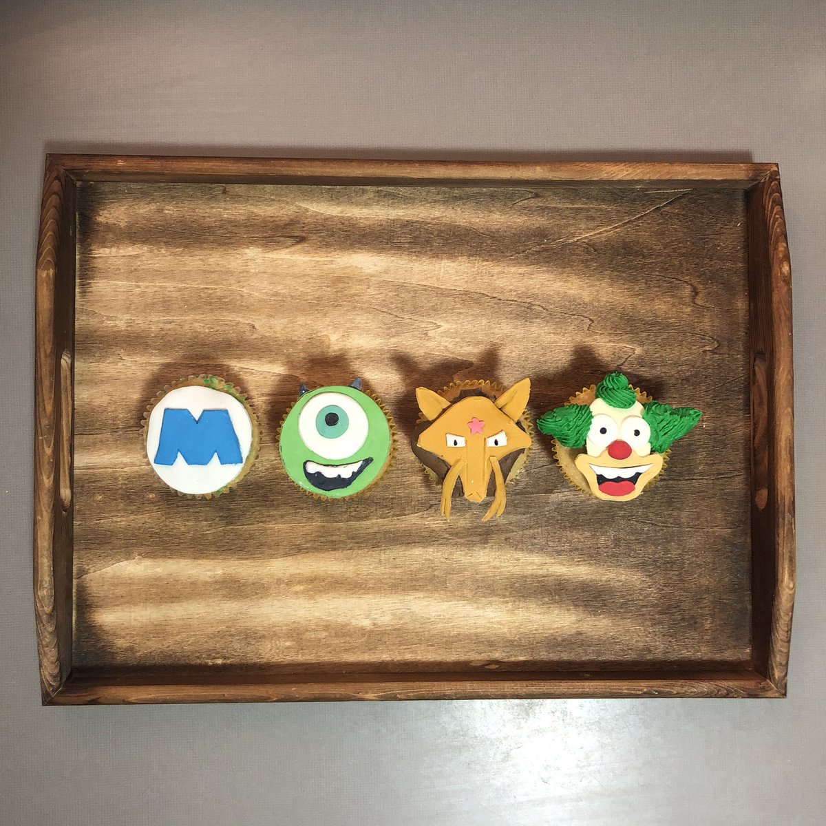 ColinsTime2Bake's tweet photo. I had a fun day making cupcakes based on what came up on my Instagram stories “which character are you” #whichcharacter #cupcakes #pixar #thesimpsons #pokemon https://t.co/BjM3Rrzi0g