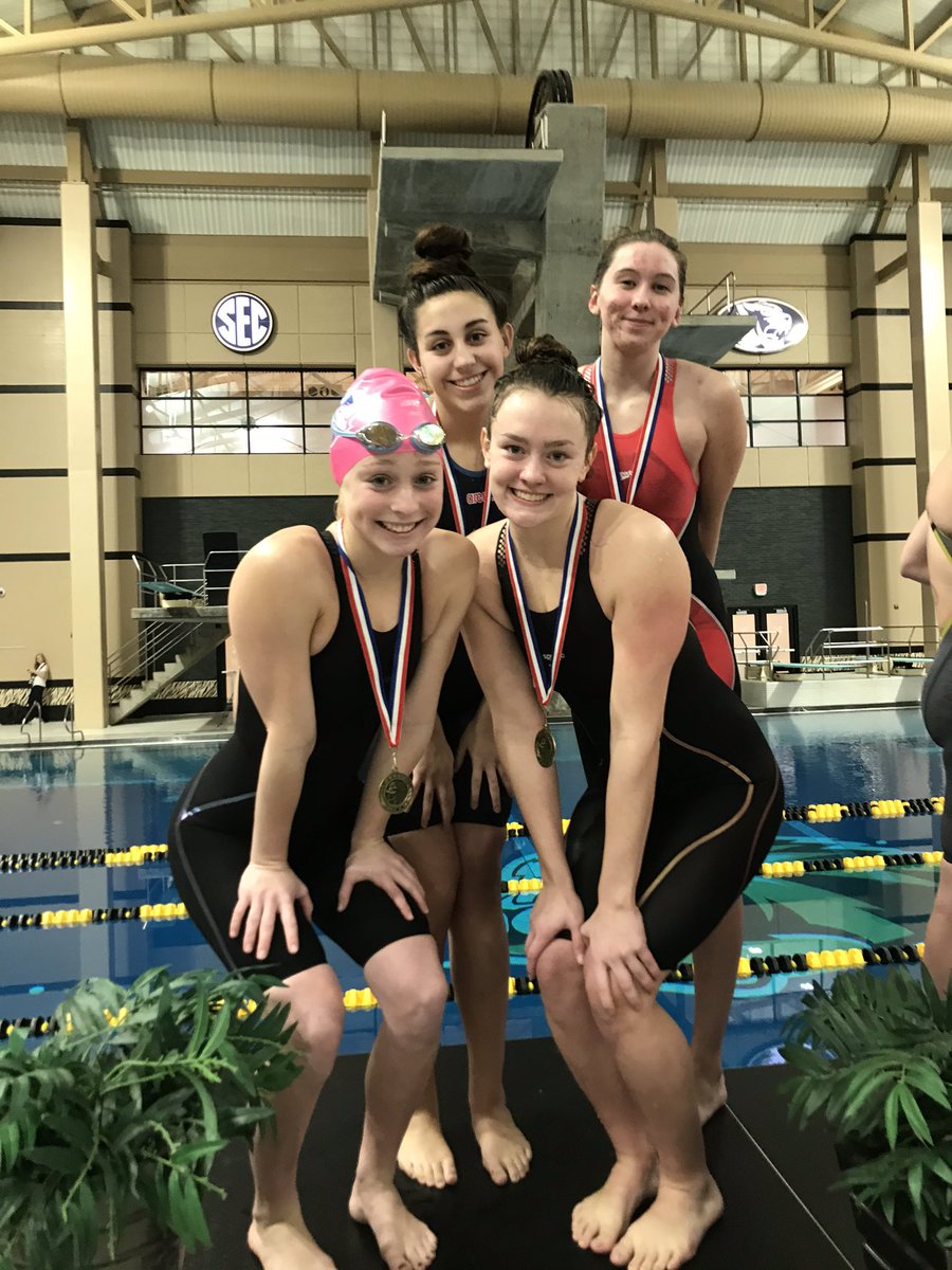 The 200 Free Relay of Kate Towns, Kate Minette, Christina Rangel, and Madi Carmichael win the 200 Free Relay at COMO!  They drop nearly a second and a half and their time of 1:39.54 is just .05 off the school record!