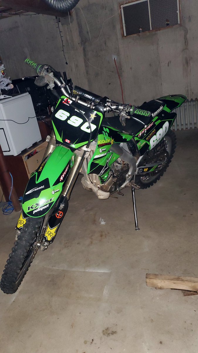 Talbot690's tweet image. Drinkin by my self. Looking at my bike. Waiting for Summer. #Kawasaki #KX250F