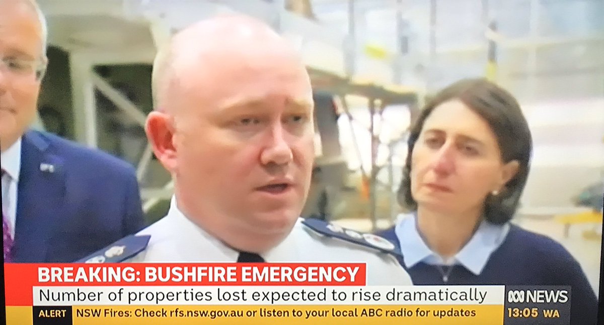 Elliegreysz's tweet photo. @ScottMorrisonMP is an absolute disappointment! Smirking #muppetmorrison in the background while real stress and emotion from @GladysB and Shane Fitzsimmons #NotMyPrimeMinister #AustralianBushfire #ScottFromMarketing https://t.co/qwKM9TIHcg