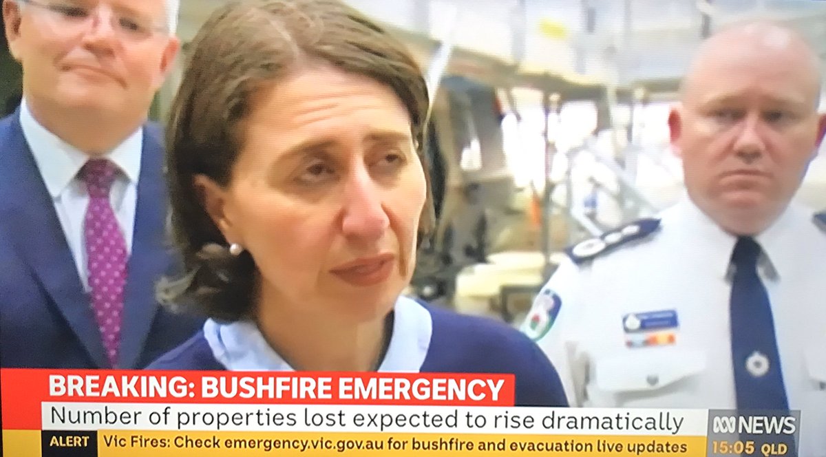 Elliegreysz's tweet photo. @ScottMorrisonMP is an absolute disappointment! Smirking #muppetmorrison in the background while real stress and emotion from @GladysB and Shane Fitzsimmons #NotMyPrimeMinister #AustralianBushfire #ScottFromMarketing https://t.co/qwKM9TIHcg