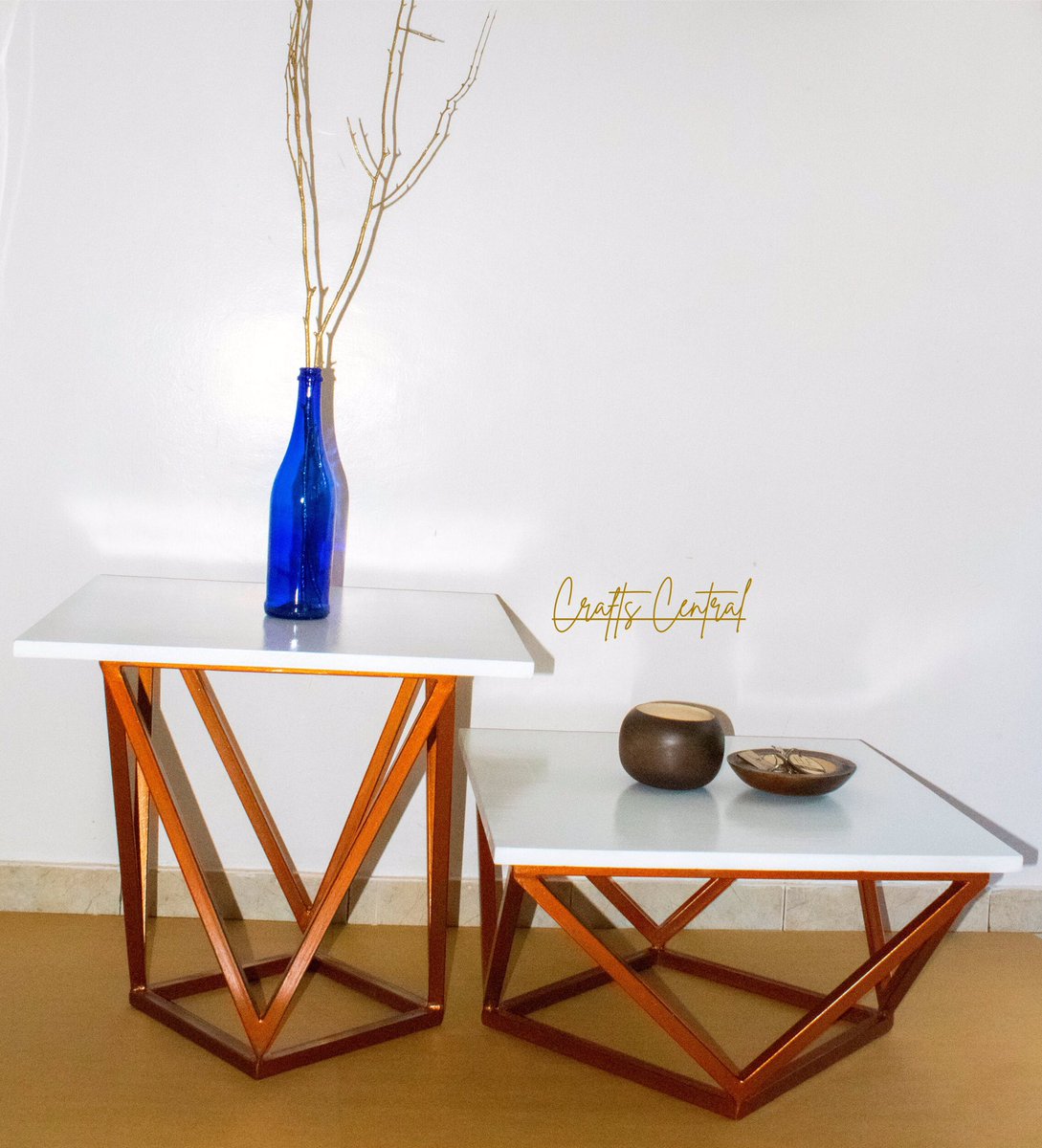 CraftsCentral1's tweet image. One known property of the copper color is its symbolism of diplomacy and independence. A true emblem of class. That’s what you bring to your home when you get these tables. #sidetable #coffeetable #coppercolor #metalfurniture #metalwood #whitetable #craftscentralshop