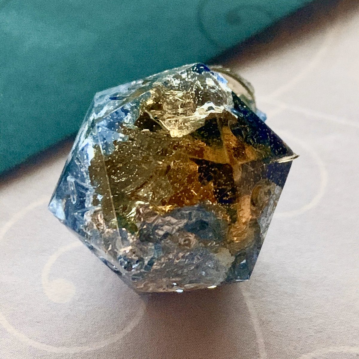 DiceDen's tweet photo. Earth sea. Blue and caramel dice with silver leaf. #dice #dicemaking #d20 #dnd #dungeonsanddragons #ttrpg https://t.co/josteMyFYC