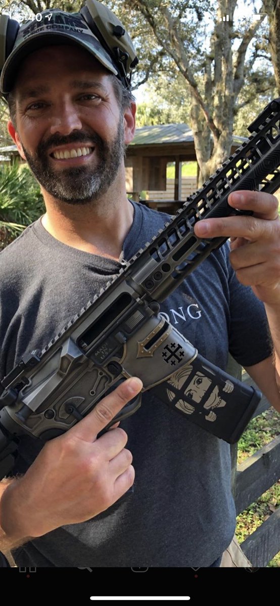 Trump idiot son with an AR that has a Hillary magazine