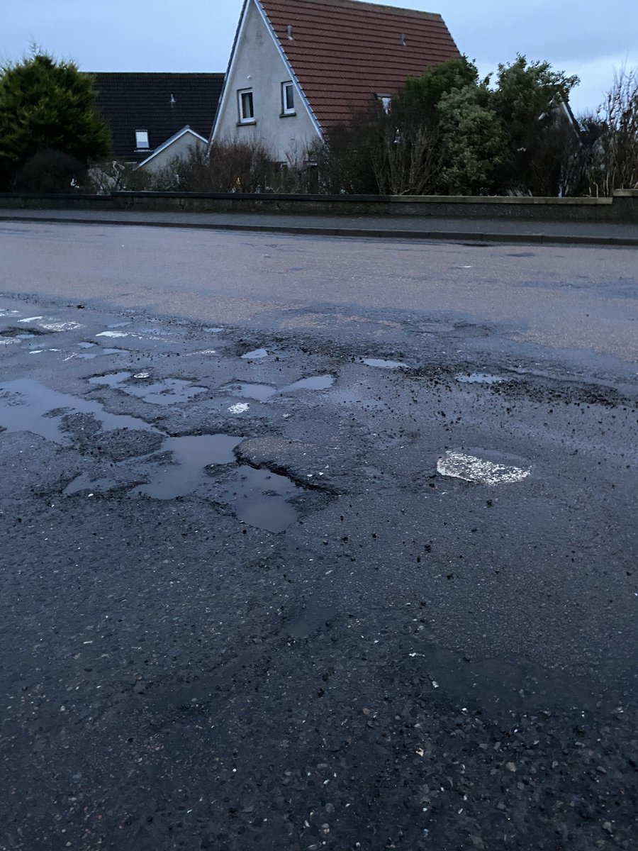 Just a fraction of the ridiculous state of Ormile Road in #Thurso. This is the result of cheap, quick repairs. The whole road needs ripped up and relaid from the Comm to the 60mph signs at Dunbar Hospital. It is currently worse than off-road conditions. 

<a href="/HighlandCouncil/">The Highland Council</a>