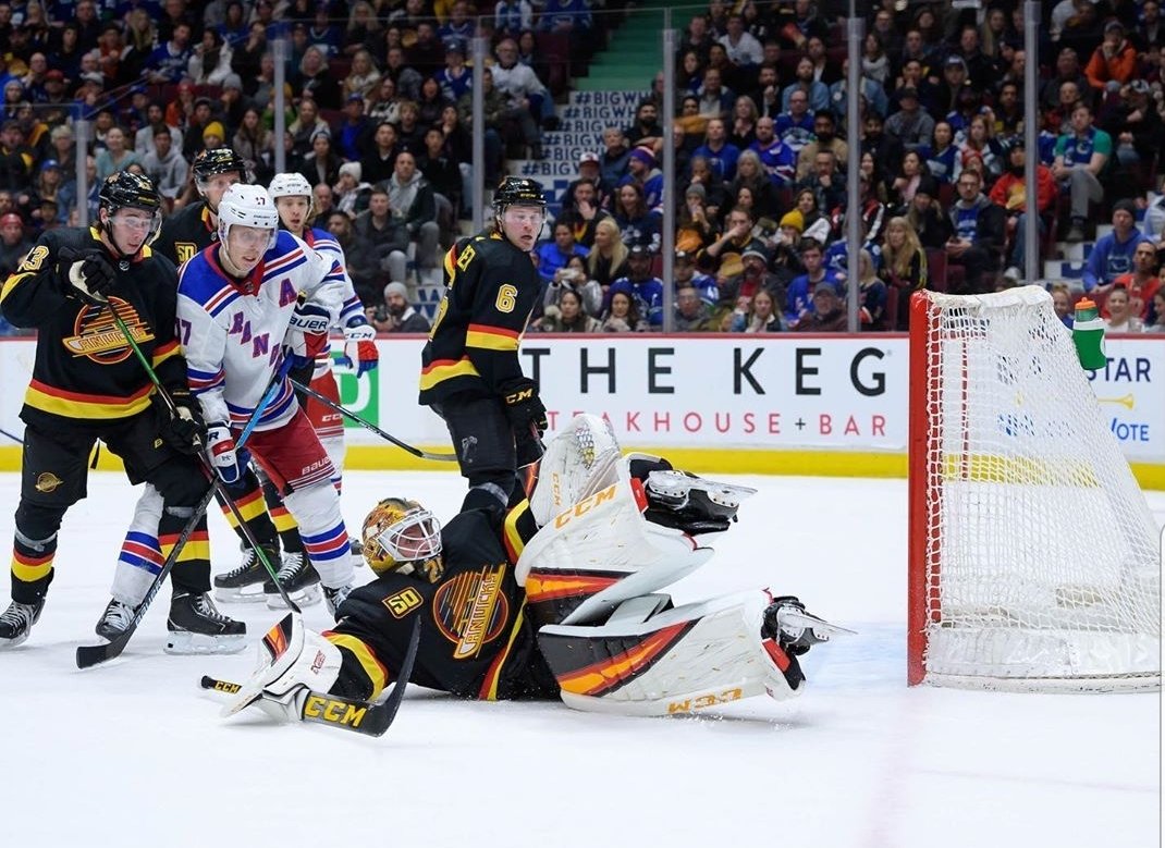 ArmchairGM1's tweet photo. Best part of the game for me last night as an old wannabe goalie and #canucks fan, was Marky's nod to Captain Kirk and the #2padstack! Loved the unis, 90s players, #Gino on skates. The score was good too! https://t.co/gYQyjsjpeG