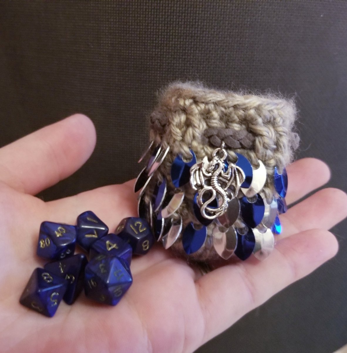 I made a pocket size dice bag to fit my mini polyhedral sets.
#dnd 
#ttrpg