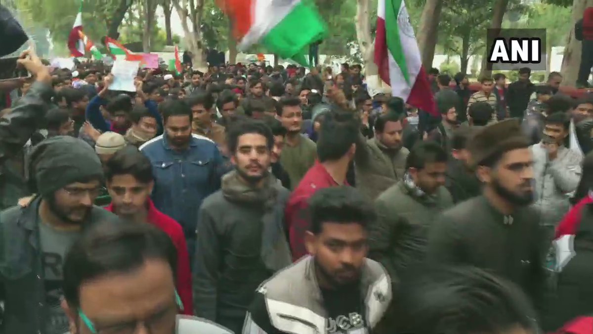 ANINewsUP's tweet photo. Aligarh: Aligarh Muslim University students hold protest march against yesterday's violence at Jawaharlal Nehru University https://t.co/v5p2P2lqll