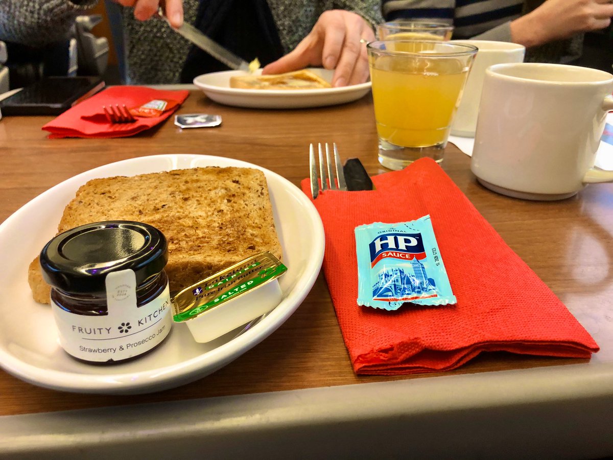 StephenVidal's tweet photo. Breakfast with @LNER

First trolley arrived to take orders for breakfast, hand out the cutlery / plate for toast along with jam, butter and sauce.

Followed by a drinks service of tea/coffee &amp; water, orange/apple juice.

Warm toast, followed shortly by breakfast 😋 @_DiningCar https://t.co/tiSxBQC7Tf