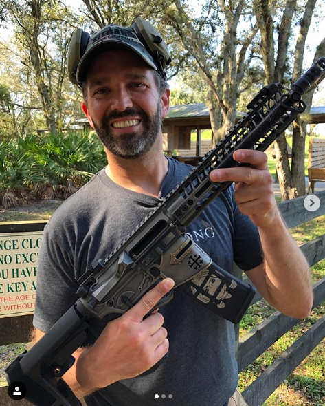 CAIRNational's tweet photo. #IslamophobiaWatch: @DonaldJTrumpJr's anti-Muslim bigotry & alt-right pandering on display @Instagram sporting a semi-automatic rifle adorned with the Jerusalem cross & crusade symbols. It's a dangerous intersection of gun-culture and Islamophobia. Oddly timed with #USIranTension https://t.co/h07C42Yb9y