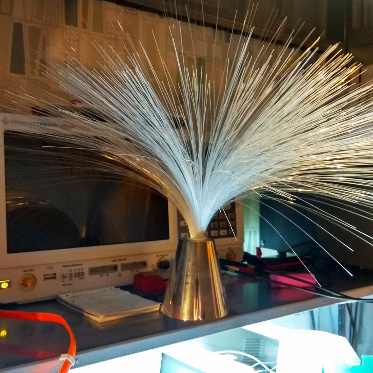 matseng's tweet image. I've tried to make a *tiny* 3x5 pixel display using optofibres connected to 15 LEDs. But crazyglueing/hotsnotting them to SMDs is  really hard. And using 3/5mm regular with a drilled hole also fails.  #failOfTheWeek (There'd a 3mm LED on the photo for size comparison)