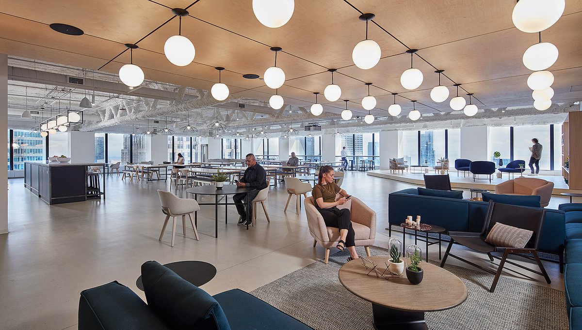 Talk about views! Revantage’s multi-level relocation takes full advantage of the unobstructed views of Chicago while offering softer boundaries between teams. bit.ly/35pzTZG #workplacedesign
