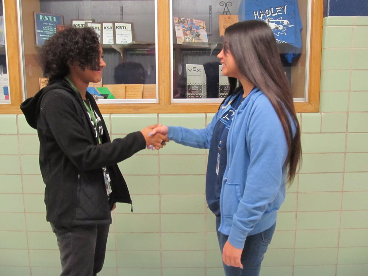 hadleypltw's tweet image. Friends share a handshake after a long winter break! Welcome back Hadley students! #HadleyRocks #WPSProud