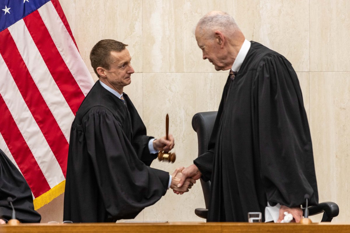 GovDougBurgum's tweet photo. Congratulations to North Dakota’s new Supreme Court Chief Justice Jon Jensen on receiving the gavel from Chief Justice Gerald VandeWalle, who provided exceptional leadership during his 27-year tenure, the longest-serving chief justice in state history. https://t.co/aBrTtstCxF