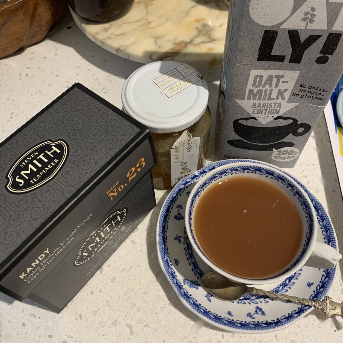 thecurioushuman's tweet photo. Powering this monday’s #freelancewriting: the pricy-but-worth-it #kandytea (named after the Sri Lankan city) by @smithteamakers; local honey w/turmeric gifted by my #airbnb host on my #baja trip; @oatly #oatmilk. #sogood #tealover #blacktea https://t.co/ndjlRQMzJl