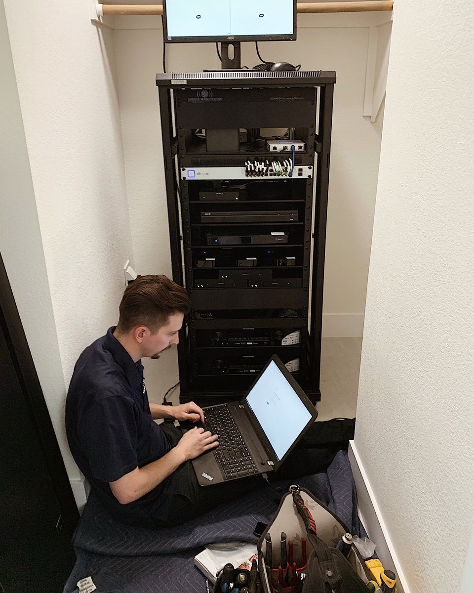 AcousticDesign's tweet image. Our programmer Austin doing what he does best... Programming! Just a few more clicks away from finishing up our client’s new Savant System. 
#avprogrammer #savant #avrack